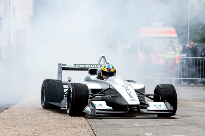 1. Lucas di Grassi performs donuts at the Qualcomm launch event using the prototyre Formula E car