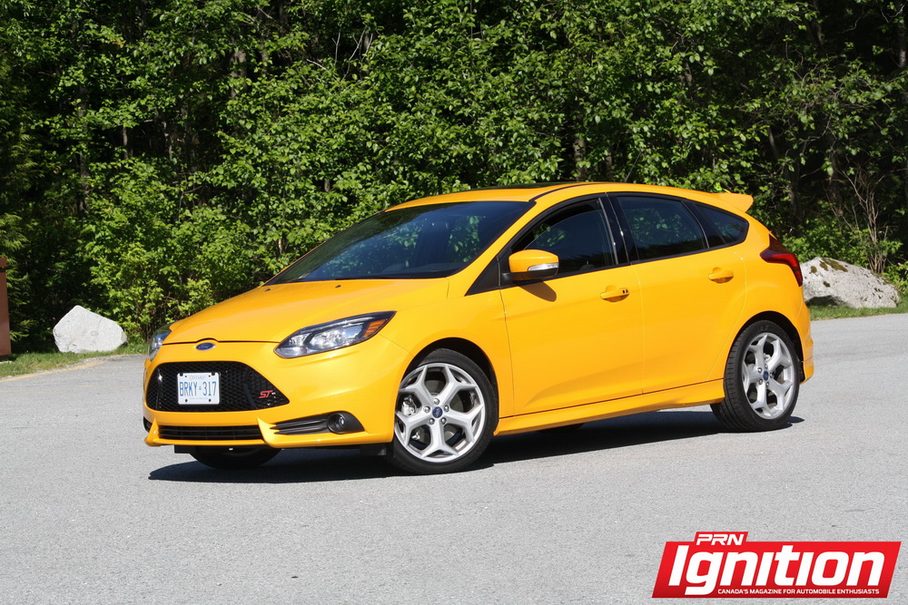 Focus ST - Focus ST is just a little more extreme-looking than Fiesta thanks to fat tires, T-spoke rims and shelf-like roof spoiler.